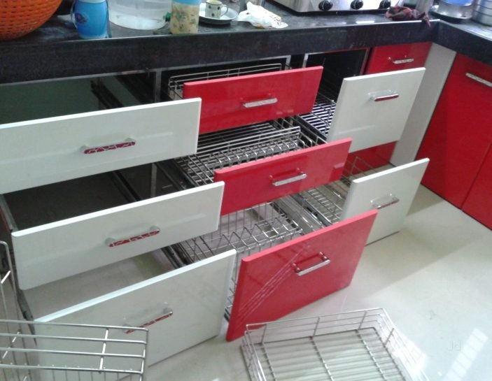 Red and white tandem kitchen trolley drawers with steel baskets
